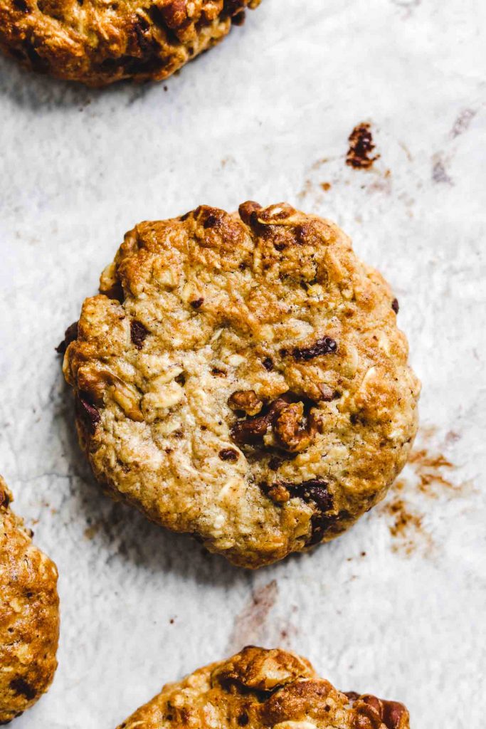 Air Fryer Tahini Chocolate Chunk Oatmeal Cookies on parchment paper