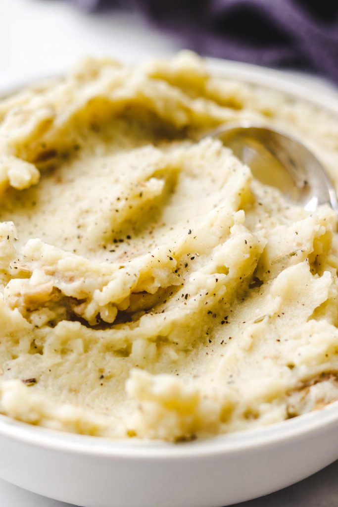 dairy free mashed potatoes in a blue bowl close up photo