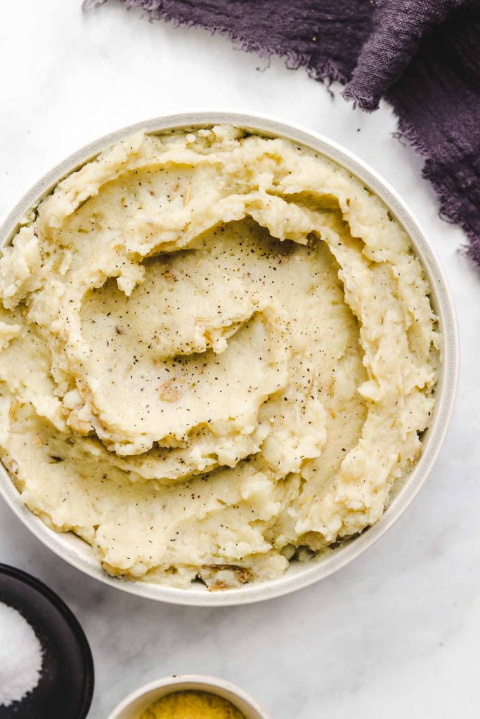 fluffy mashed potatoes in a blue bowl