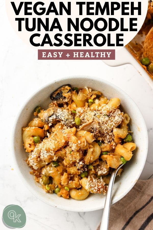 healthy vegan tempeh tuna noodle casserole in a bowl with breadcrumbs and a fork pinterest image