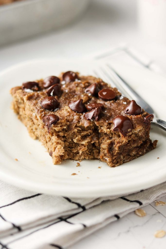 peanut butter banana bread bars with chocolate chips bite shot