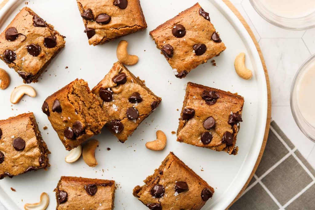 cashew butter blondies on a white plate