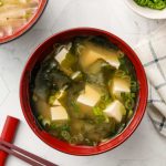 vegan tofu wakame green onion miso soup in a bowl