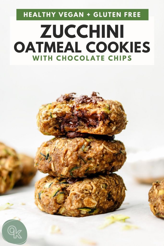 stack of zucchini oatmeal cookies with chocolate chips and a bite taken out of the top cookie