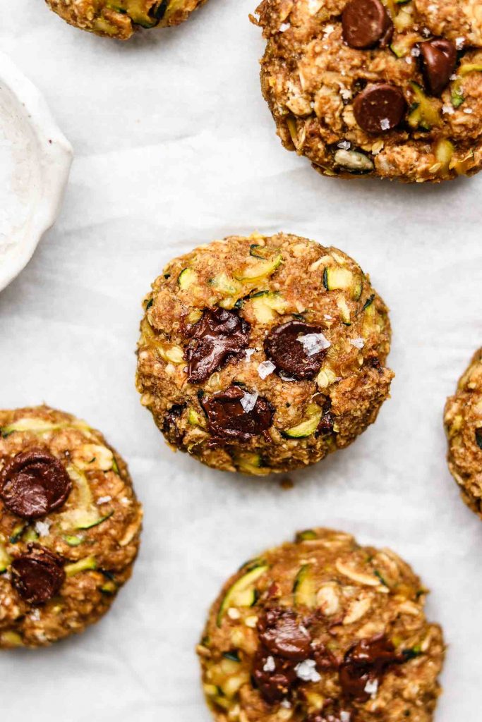 gluten free eggless zucchini oatmeal cookies on parchment paper