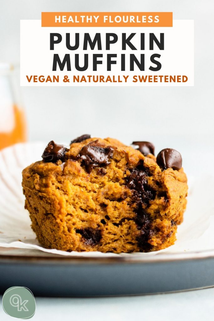 vegan pumpkin muffins on a white and blue plate with a bite taken out of it
