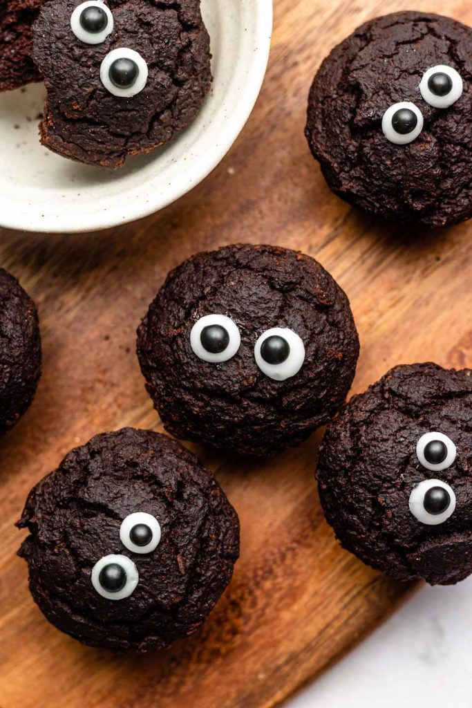 mini brownie bites with eyes on a cutting board