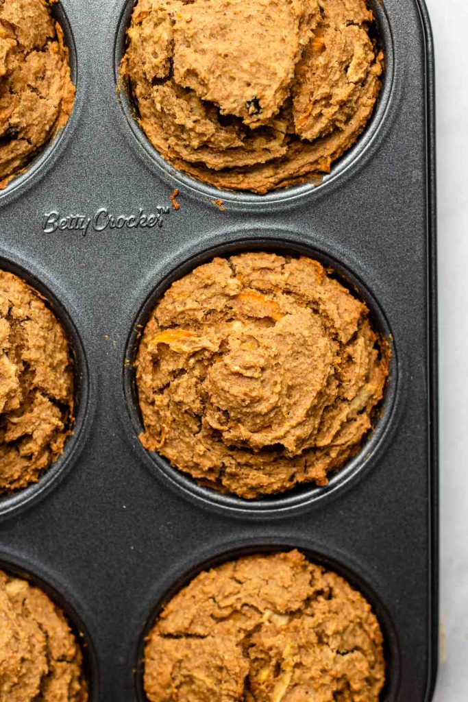 carrot apple muffins in a 6 cup muffin tin baked