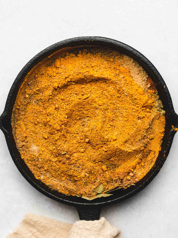 japanese curry powder spices in a cast iron skillet