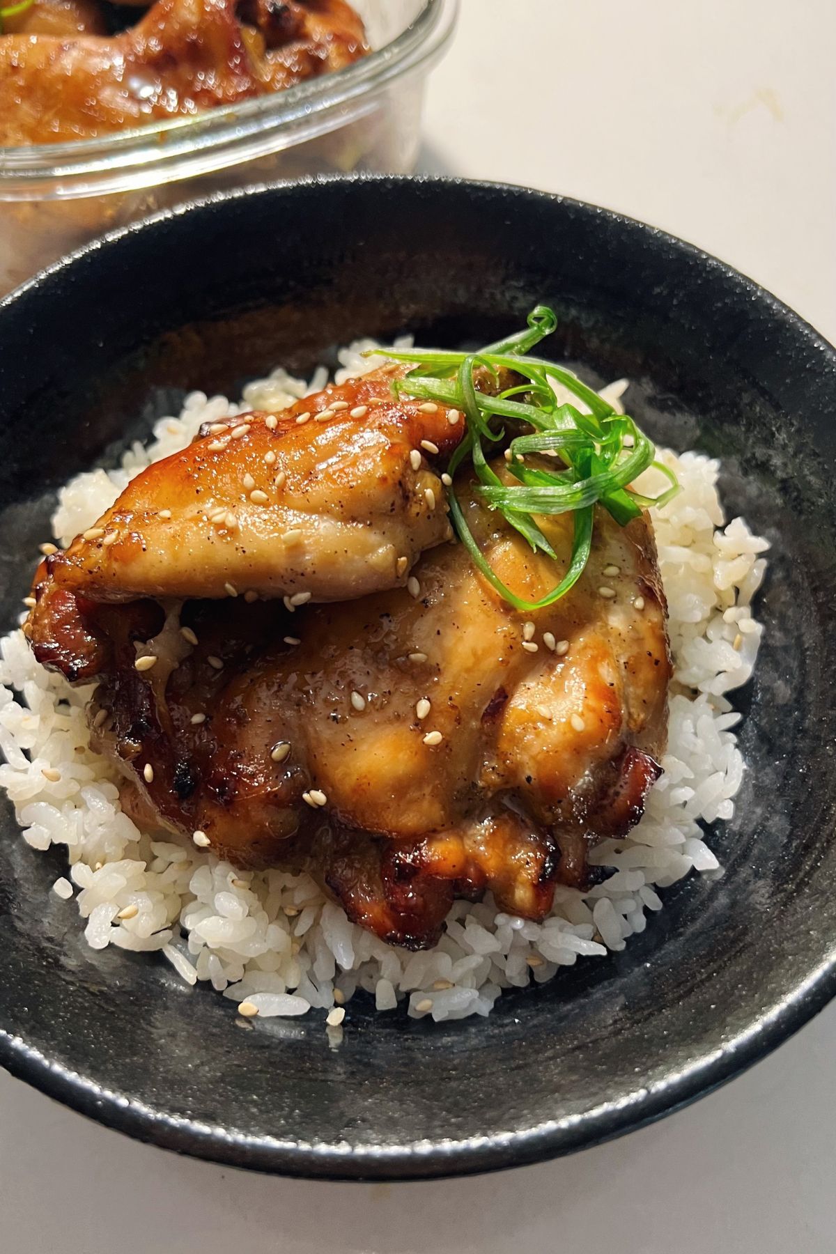 bulgogi chicken in a blue rice bowl