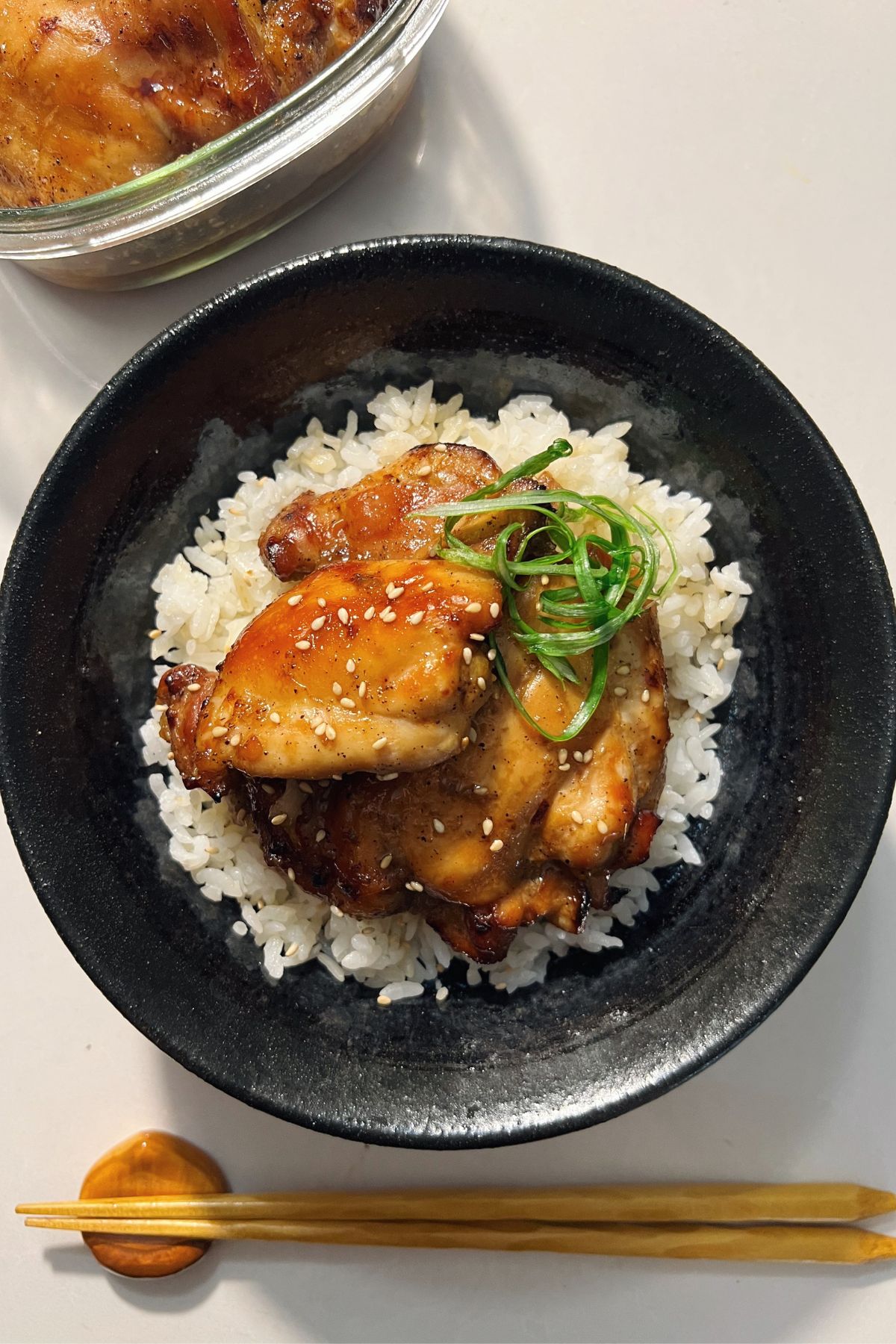 chicken bulgogi over rice and topped with scallions 